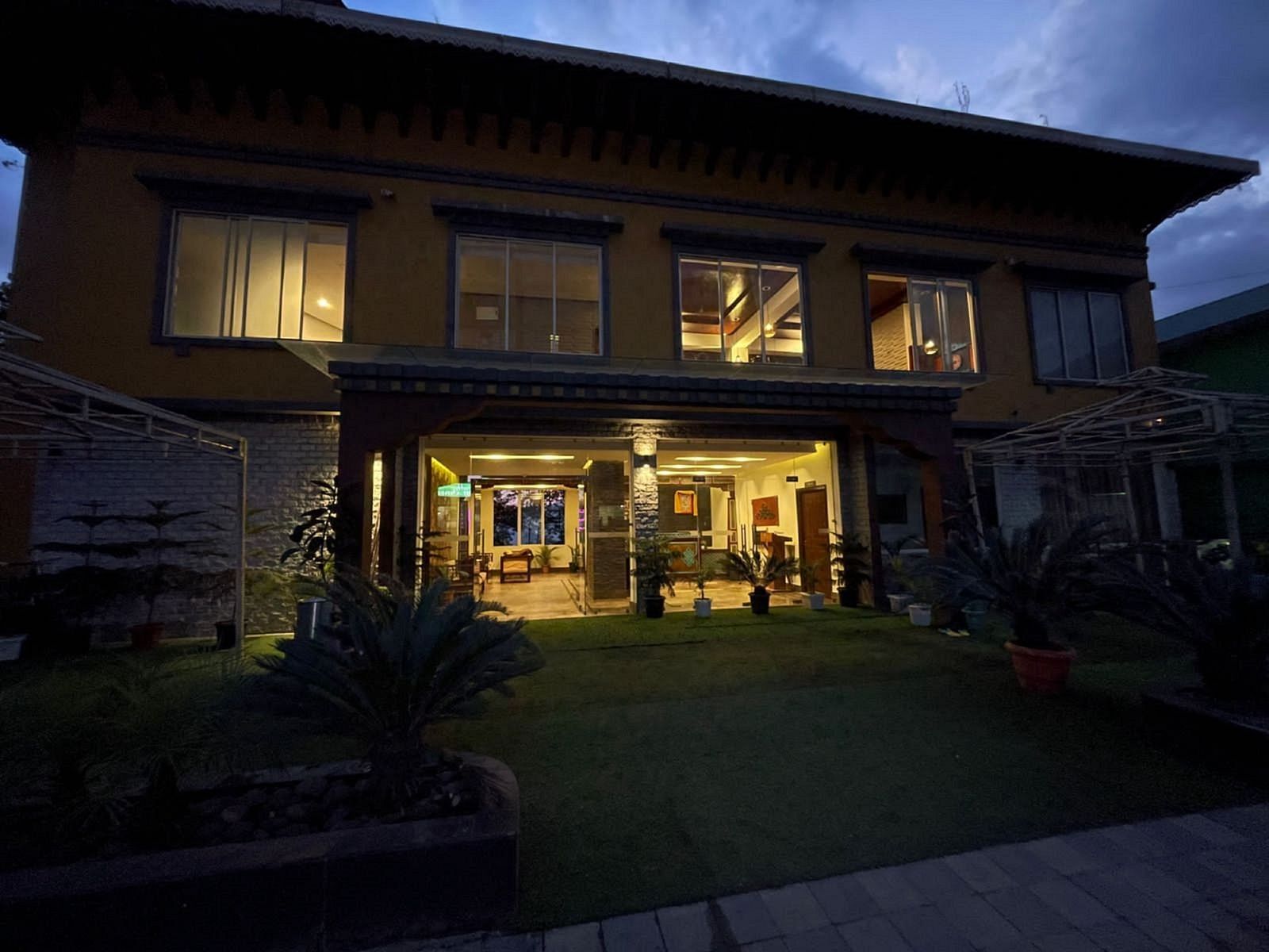 Facade image of Sumitel Gangtok with bright lighting