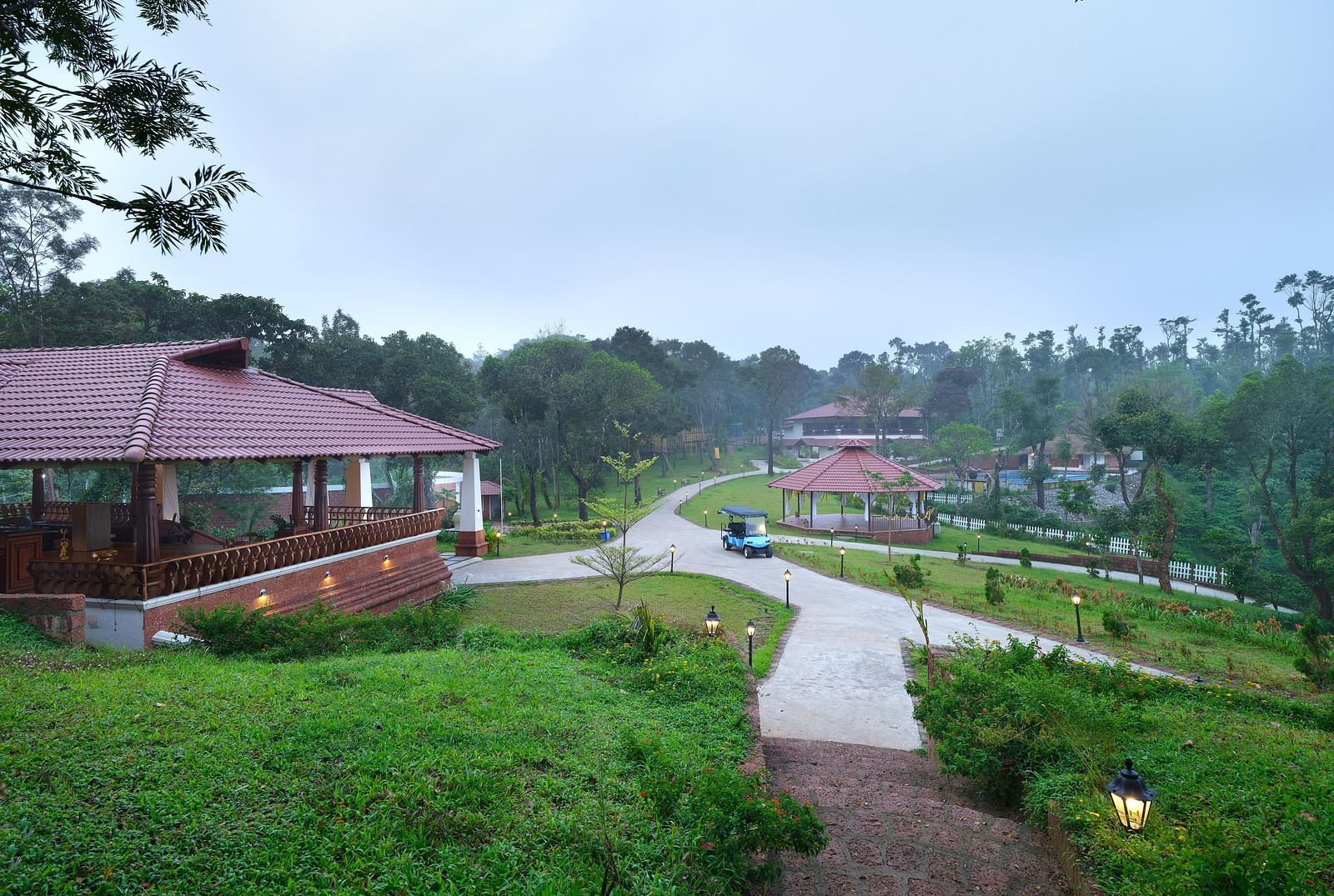 A serene cottage view looked at during a morning fog