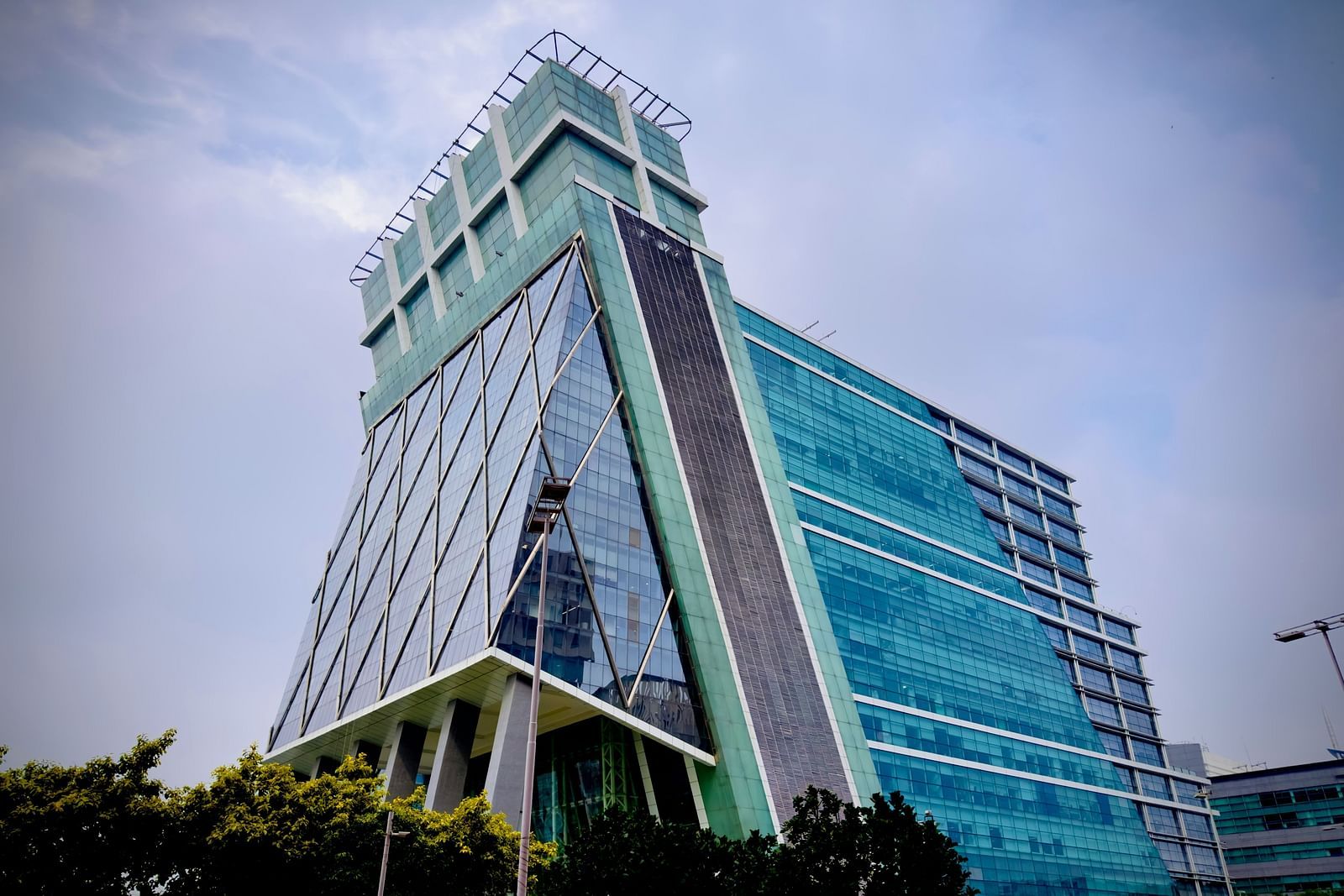 an overview of DLF cybercity with white clouds on blue sky in the background