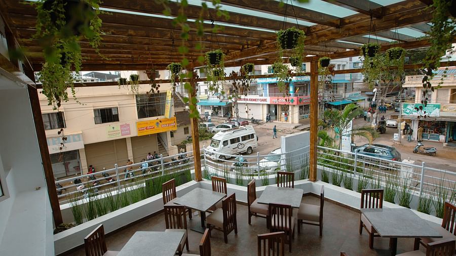 Seating arrangement of the Zest Restaurant at The Pearl Hotel, Hassan - 2