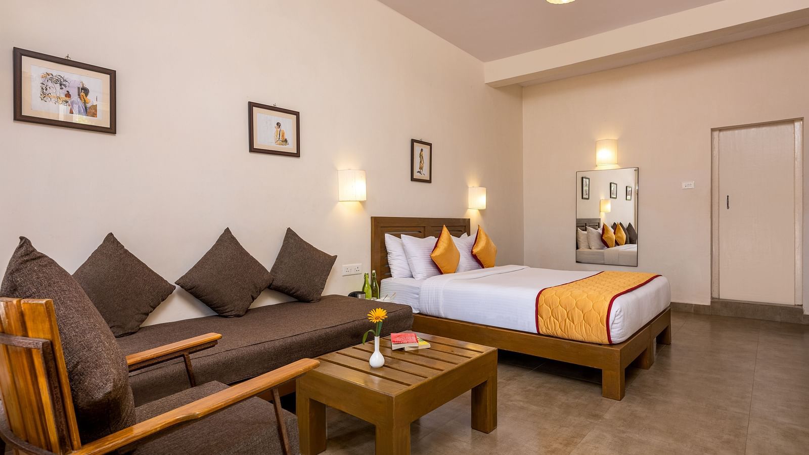 A large suite with beds and sofa placed | Mango Hill, Kodaikanal
