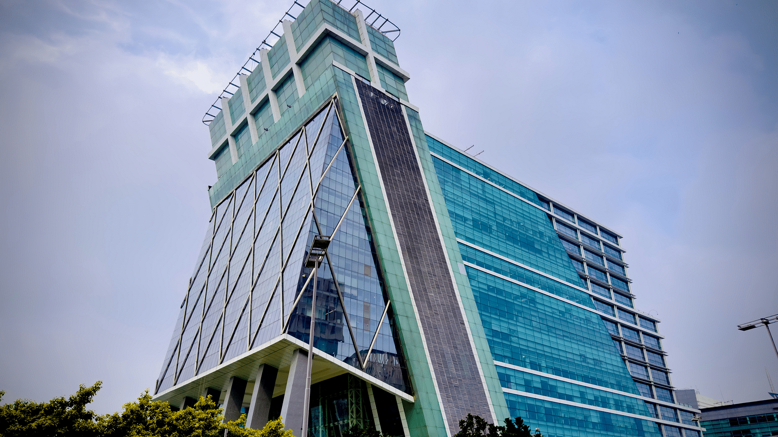 an overview of DLF cybercity with white clouds on blue sky in the background