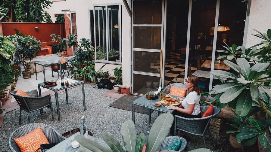 Outdoor dining arrangement at Ekaa Villa & Kitchen - 2