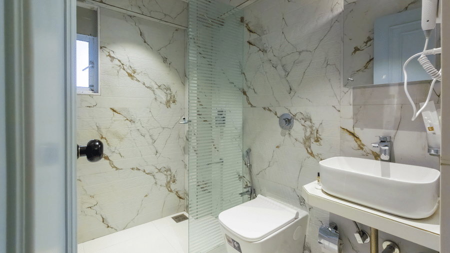 Stylish bathroom with premium fittings at Home2 Residency, Mumbai Airport