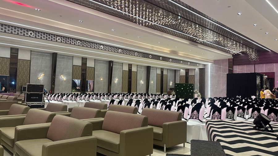 Spacious Banquet Hall with Elegant Lighting and Striped Flooring - VRR Astoria Hotel and Conventional Centre