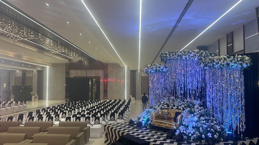 Elegant Indoor Banquet Hall with Stylish Striped Flooring and Ceiling Lights - VRR Astoria Hotel and Conventional Centre