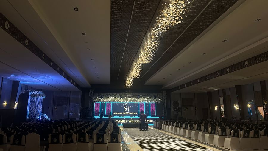 Elegant Indoor Banquet Hall with Stylish Striped Flooring and Ceiling Lights - VRR Astoria Hotel and Conventional Centre