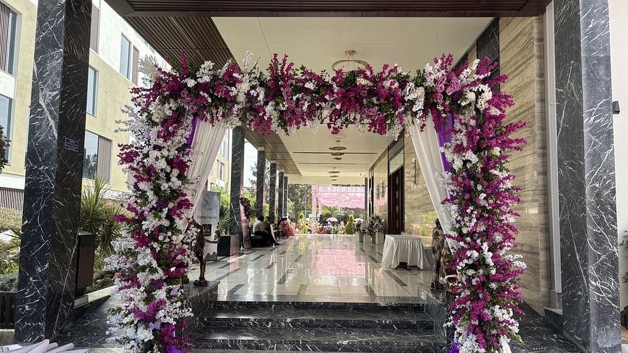 Entrance Decorated with Drapes and Elegant Floral Arrangements - VRR Astoria Hotel and Conventional Centre