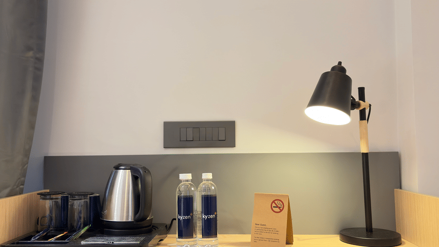Luxury Suite desk amenities and lamp – Hotel Kyzen, Shamshabad Airport, Hyderabad