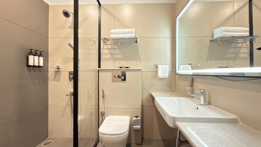 Premium Suite King Beds shower and toilet – Hotel Kyzen, Shamshabad Airport, Hyderabad