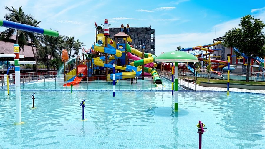 View of swimming pool with slides 
