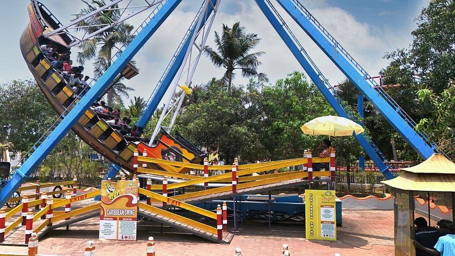 amusement park ride, a large swing 