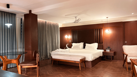 Cosy seating area within the room at Lords Riverside Resort, Muduba - Shivamogga