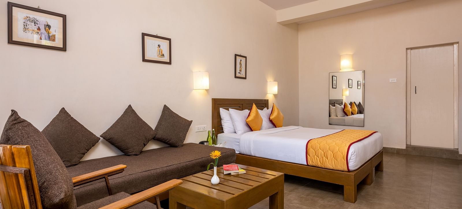 A large suite with beds and sofa placed | Mango Hill, Kodaikanal