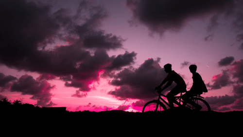 Silver Sand Hotels and Resorts - silhouette of two people cycling