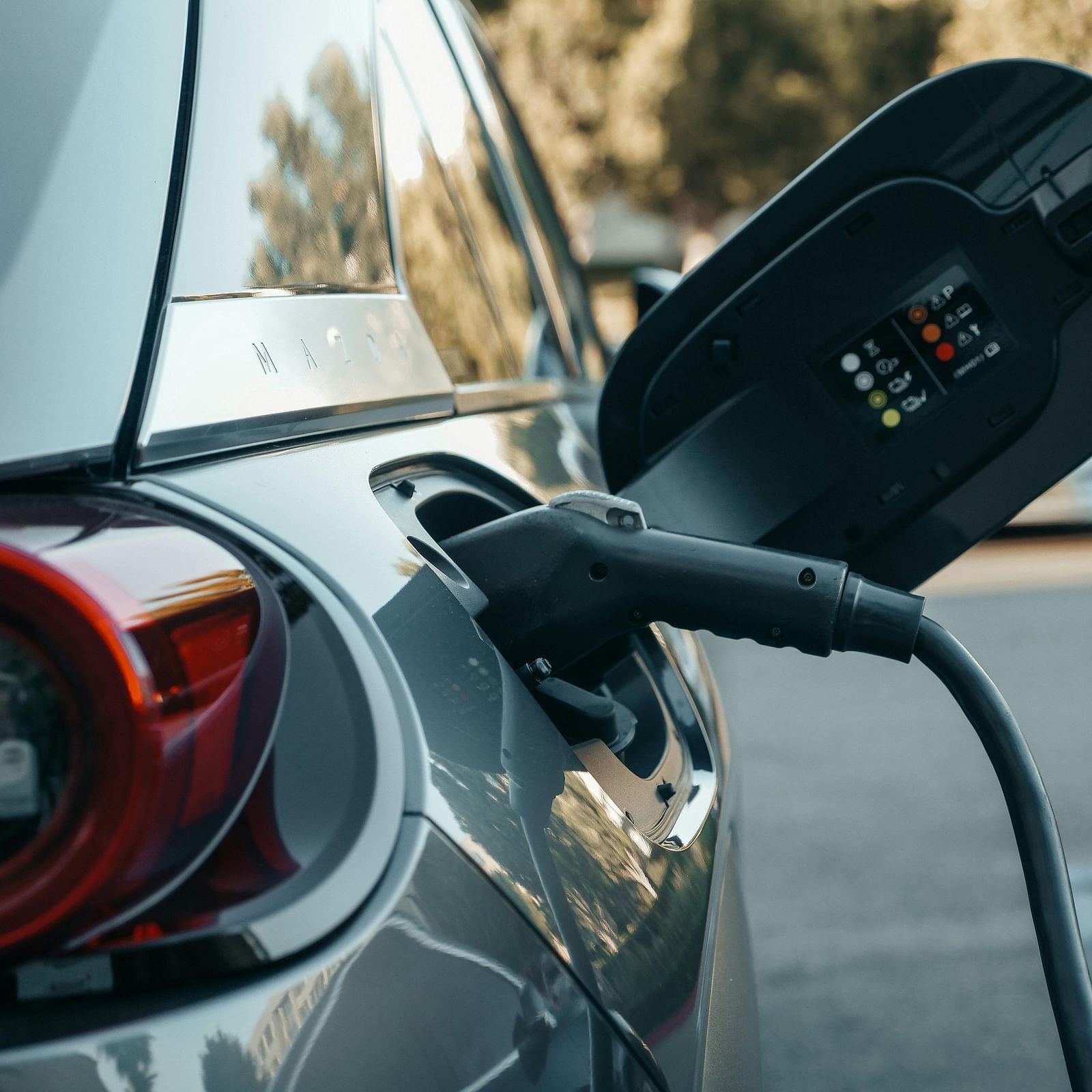 image of a car getting filled with fuel