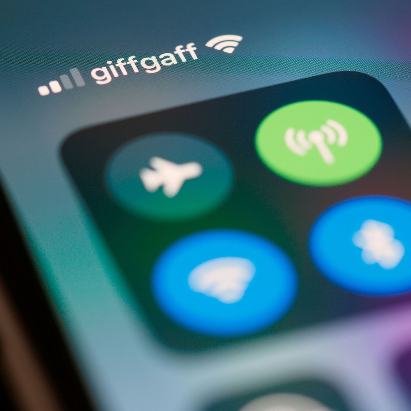 Close-up shot of a smartphone screen showing network and connectivity icons