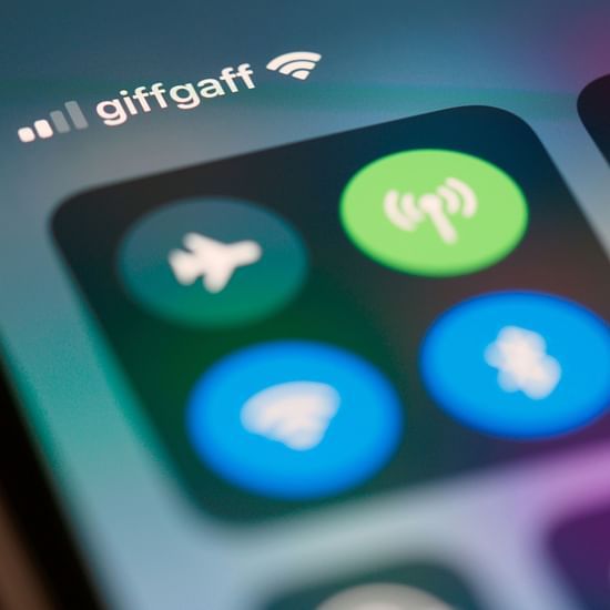 Smartphone screen showing control panel with icons for airplane mode, Wi-Fi, and mobile data.