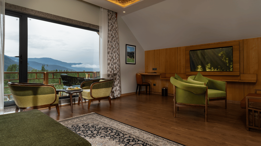 Spacious suite at Mountnoor Sarovar Premiere, Pahalgam with stylish interiors and breathtaking mountain views.