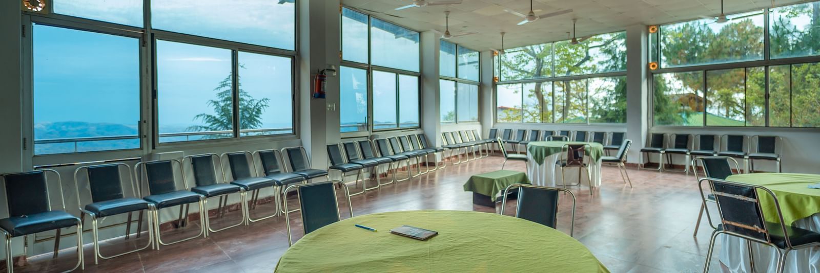 round tables placed in the event venue at Flutter Hotels & Resorts