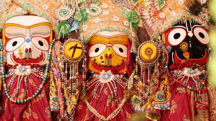 Close-up view of Lord Jagannatha, Goddess Subhadra, and Lord Balrama, fully decorated.