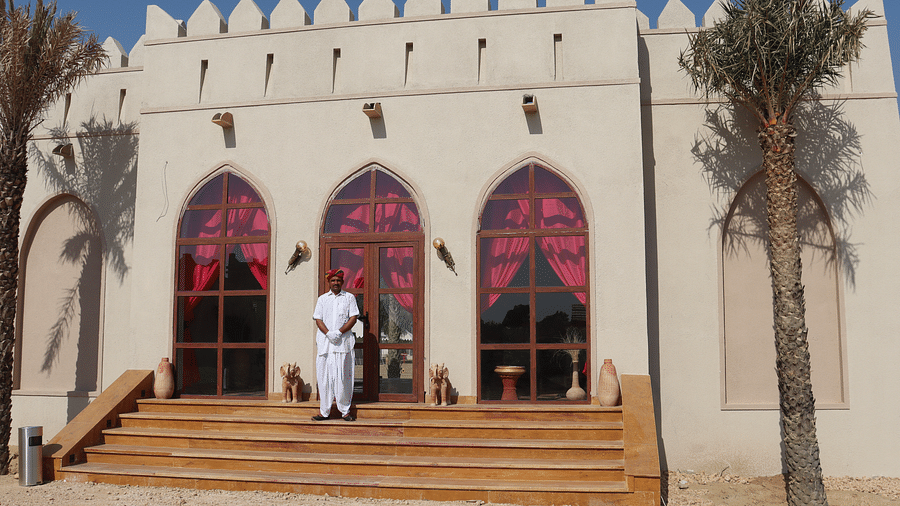 The entrance to the resort has steps leading up to three archways - Karwaan Jaisalmer