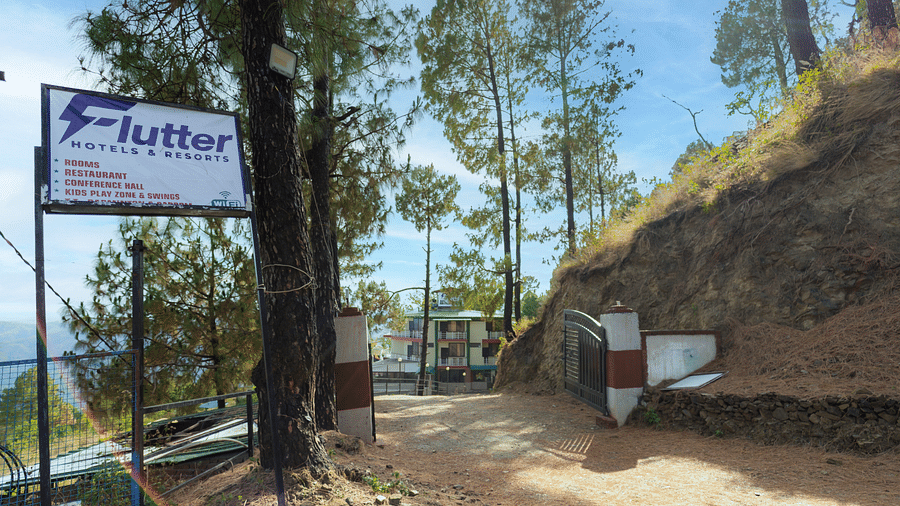 a sign board of Flutter Hotels & Resorts