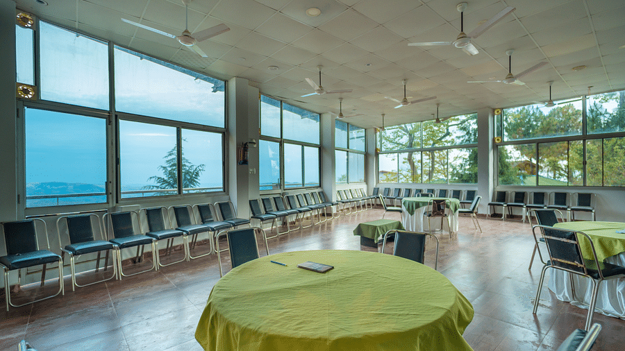 round tables placed in the event venue at Flutter Hotels & Resorts