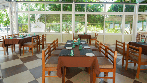 Picture featuring the dining area, well lit in the daytime - MGM Whispering Wind's Resorts