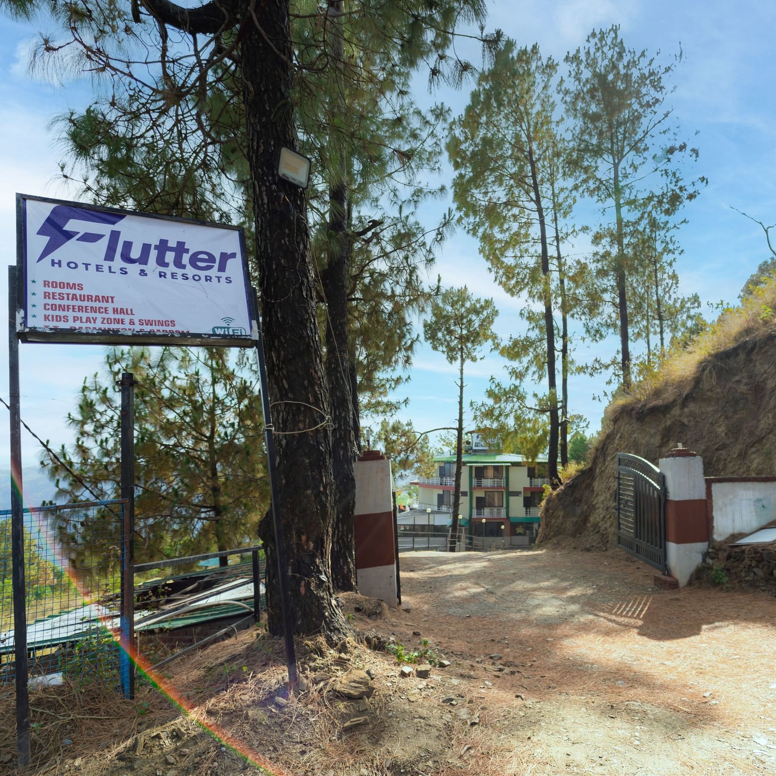 a sign board of Flutter Hotels & Resorts