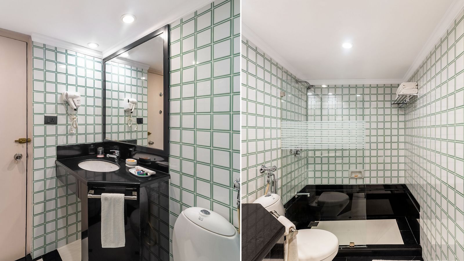 a well equipped bathroom with toiletries, a hair dryer, and a expansive mirror - Hotel Rajdarshan, Udaipur.