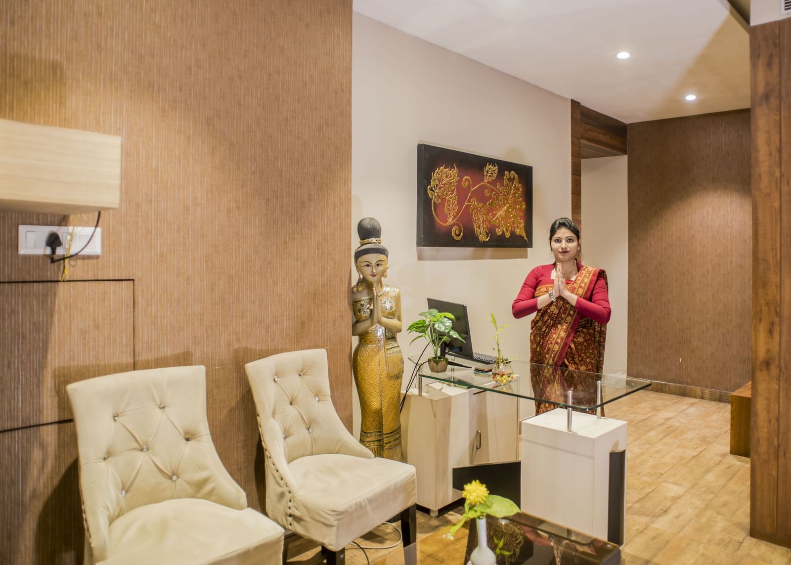A well-decorated waiting area or lobby at The Citi Residenci Hotel, Asansol.