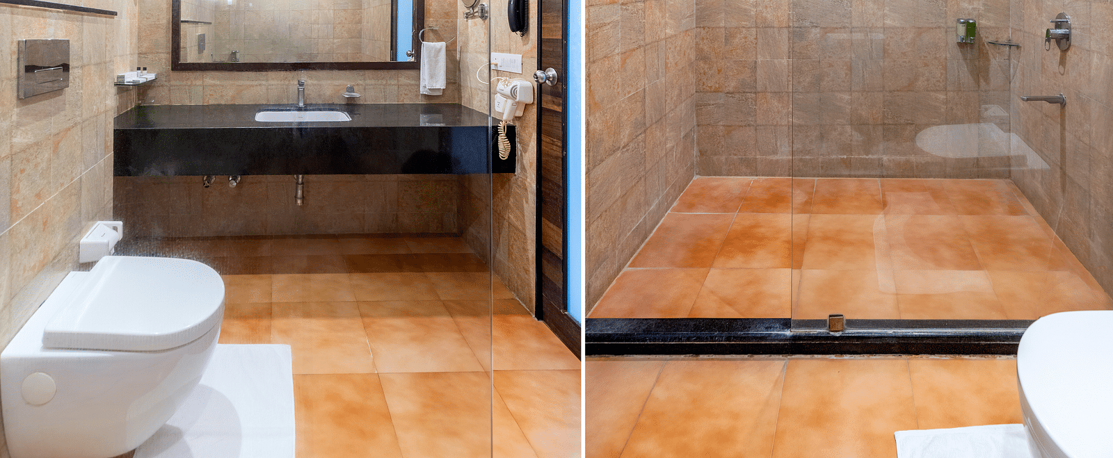 A bathroom with a glass shower door, toilet, and sink in a modern design - Via Lakhela Resort & Spa