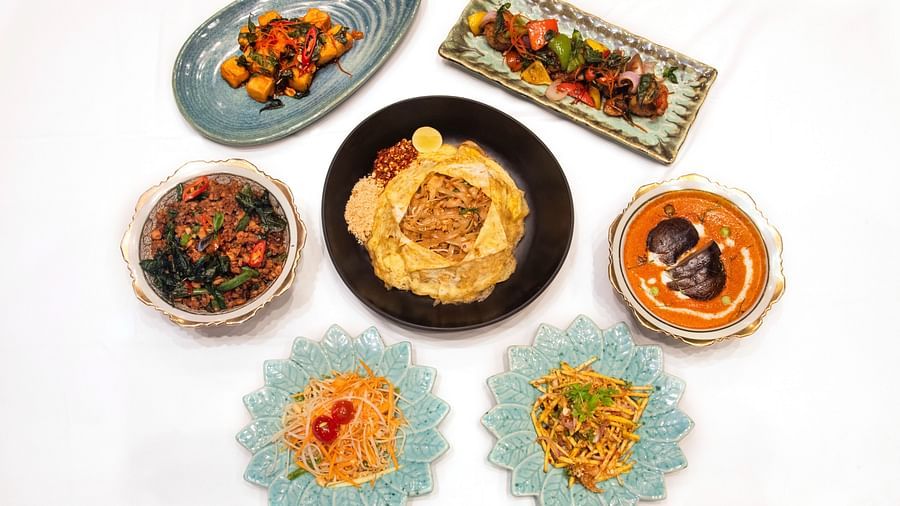 image of a delicious spread of multi cuisine delicacies served by the pickwick multi cuisine restaurant - The Claridges New Delhi