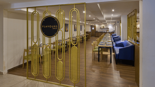 The entrance to our restaurant in Bengaluru with a signage representing the name of our restaurant - Grand Continent, Brookefield