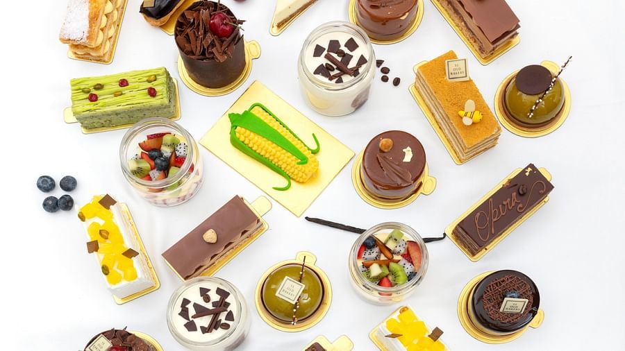 image of a wide variety of baked items that are served by the ye old bakery - The Claridges New Delhi
