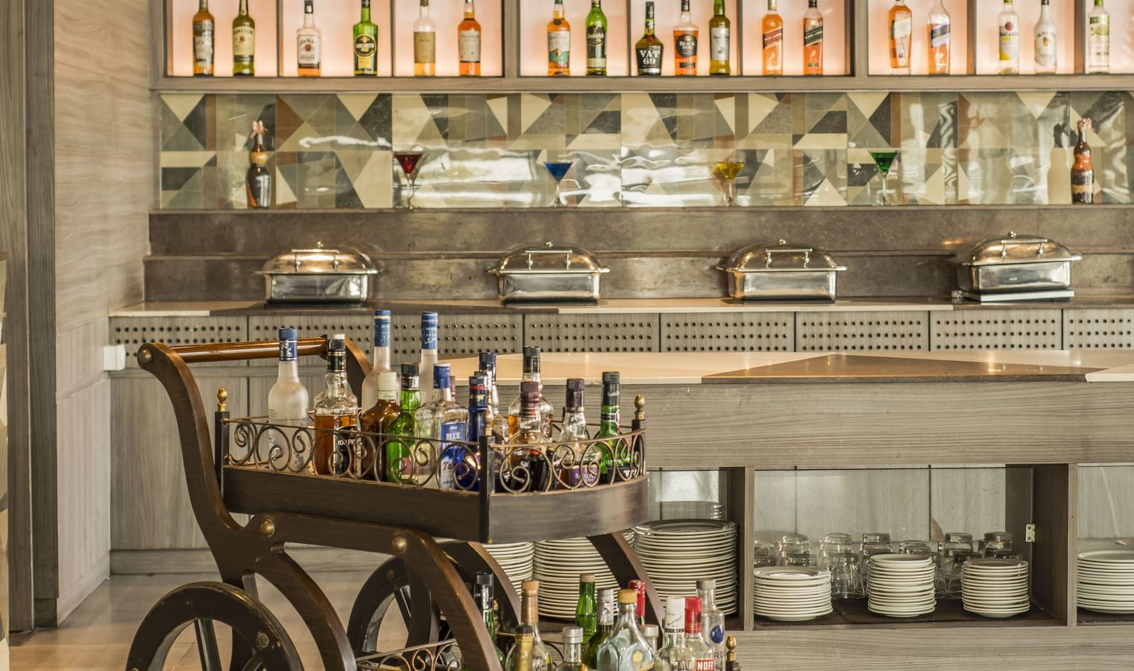 A unique bar setup with a mobile cart at The Citi Residenci Hotel, Asansol.