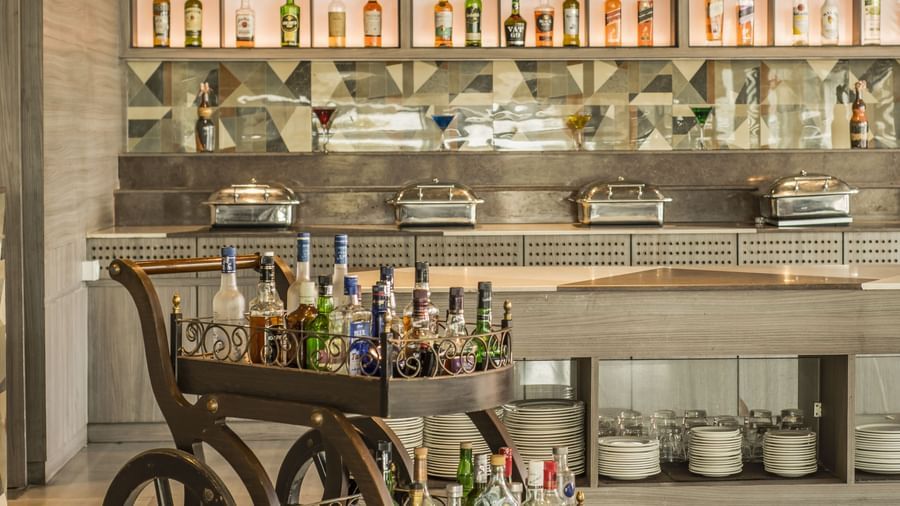 A unique bar setup with a mobile cart at The Citi Residenci Hotel, Asansol.