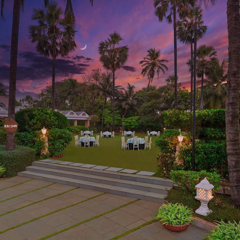 RBC Lawn with lush greenery, chairs and table