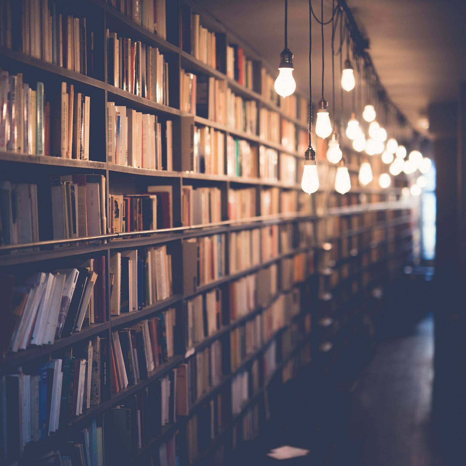 A shelf full of books in library.