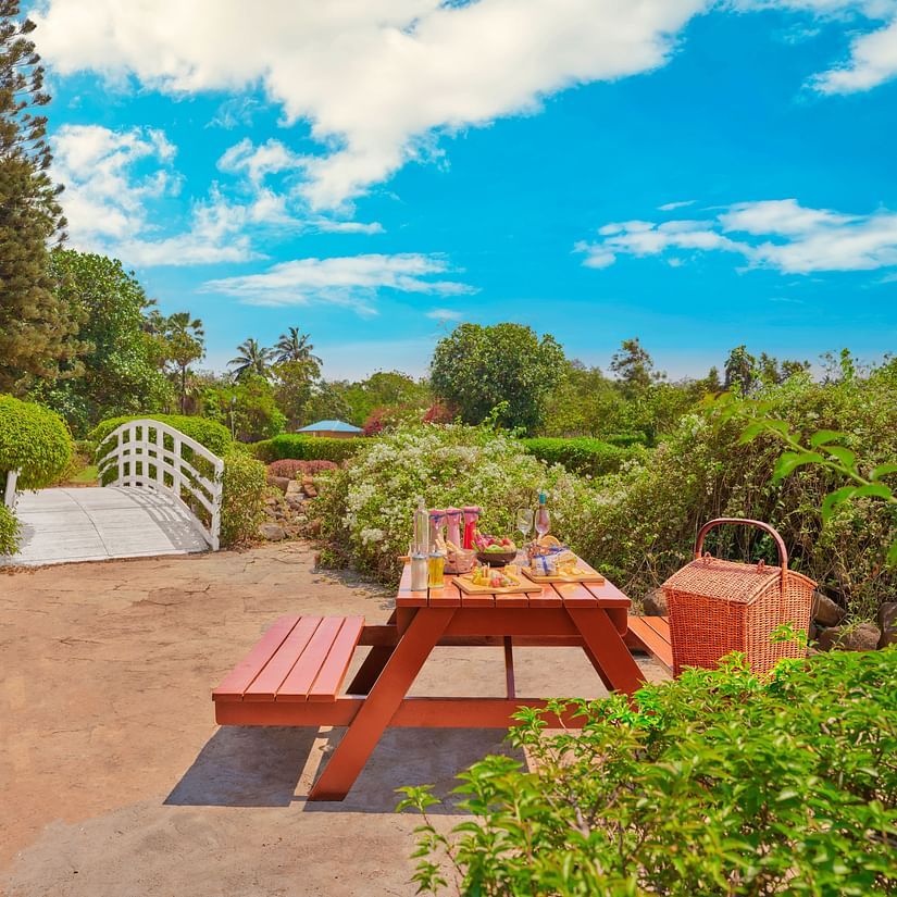 A table in the garden during the day | The Resort