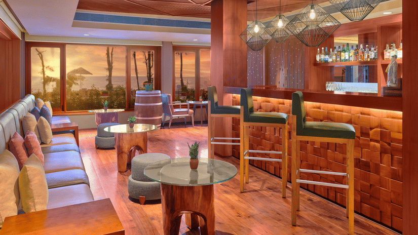 A seaside bar with comfortable seating and great ambience at The Resort, Mumbai
