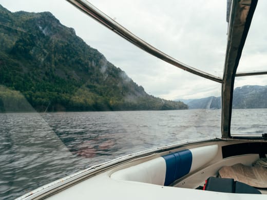 View from inside a covered boat on the water