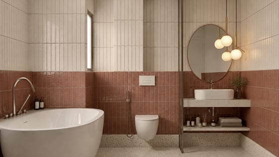 Suite bathroom with a glass shower screen and a stone counter | Shirgaonkar Beach Resort