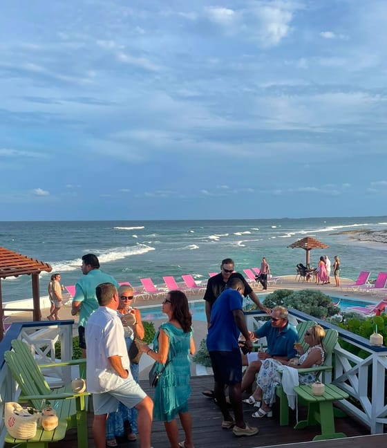 Wedding guests celebrating on the deck at Abaco Inn
