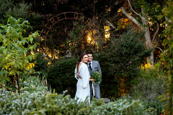 A couple in the garden at Brewery Gulch Inn
