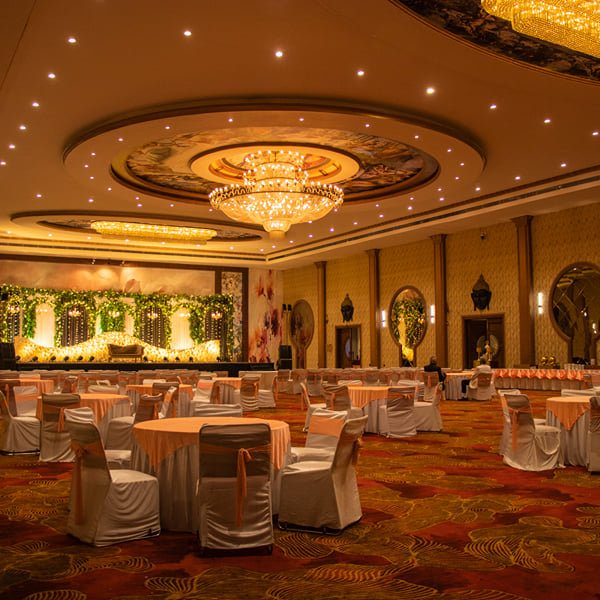 Chandelier-lit Galaxy Hall dressed for a wedding at Skyline Resort & Convention Centre