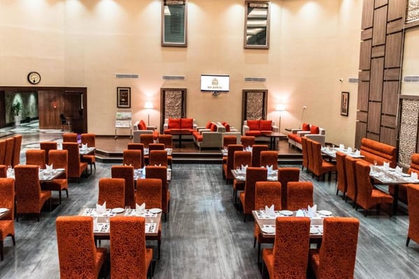 Maxims fine-dining multi-cuisine restaurant at RG Royal Hotel & Convention, Bengaluru