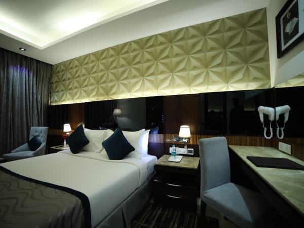 Guest room interior at RG Royal Hotel & Convention, Bengaluru
