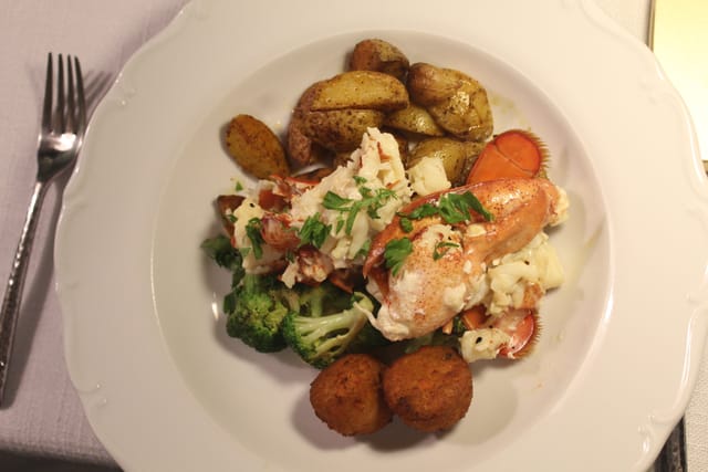 A plated lobster course prepared by the chefs at Hartstone Inn
